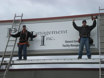 Piece Management sign installation employment opportunities and partnerships Green Manufacturing